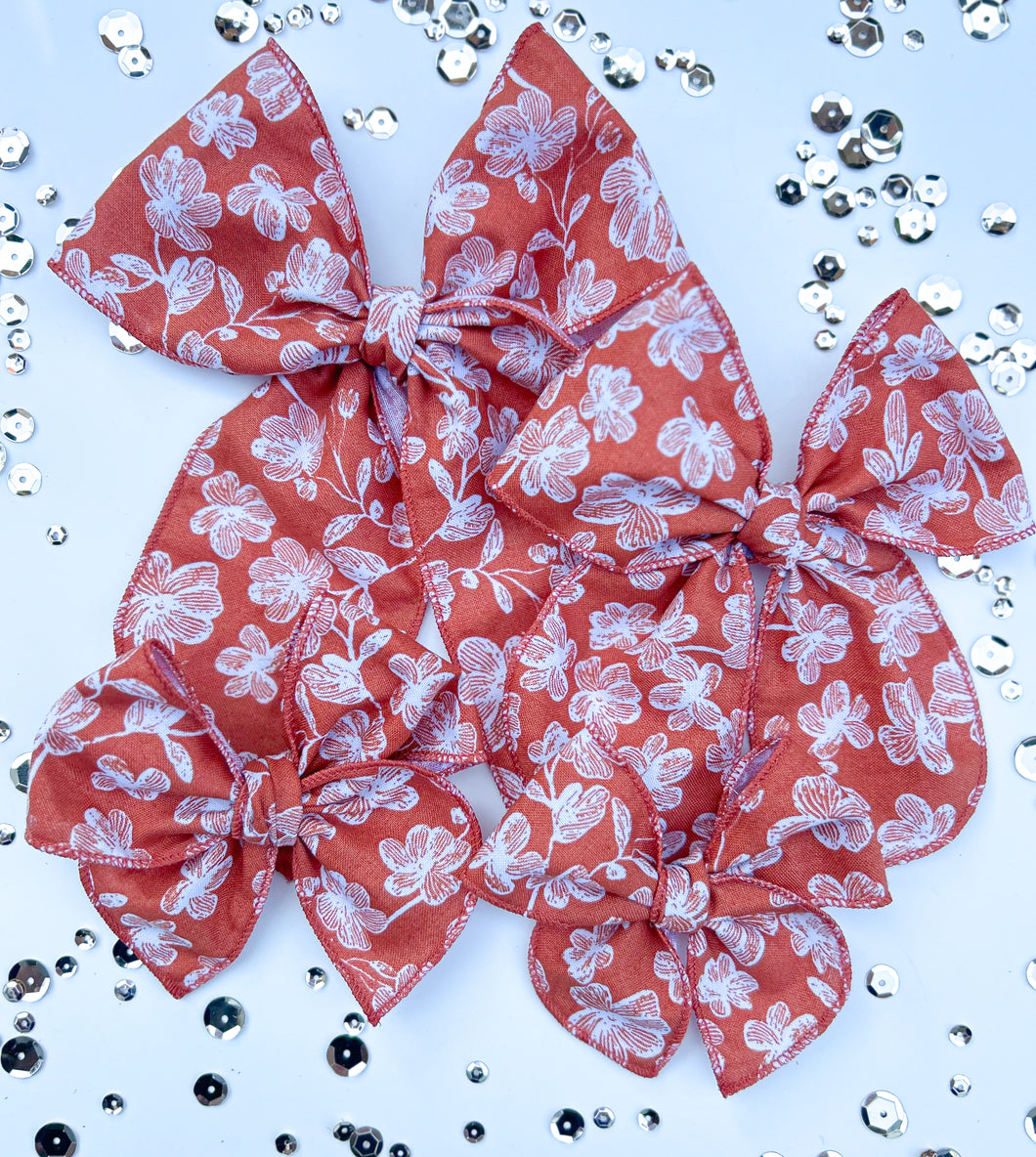 The Deep Coral Floral Bow