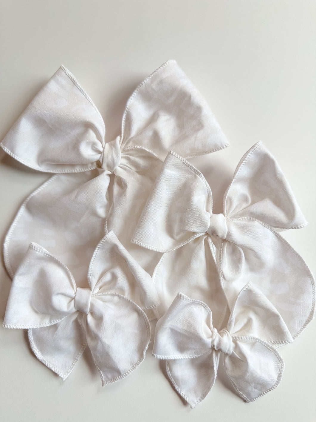 The White Leopard Wholesale Bow