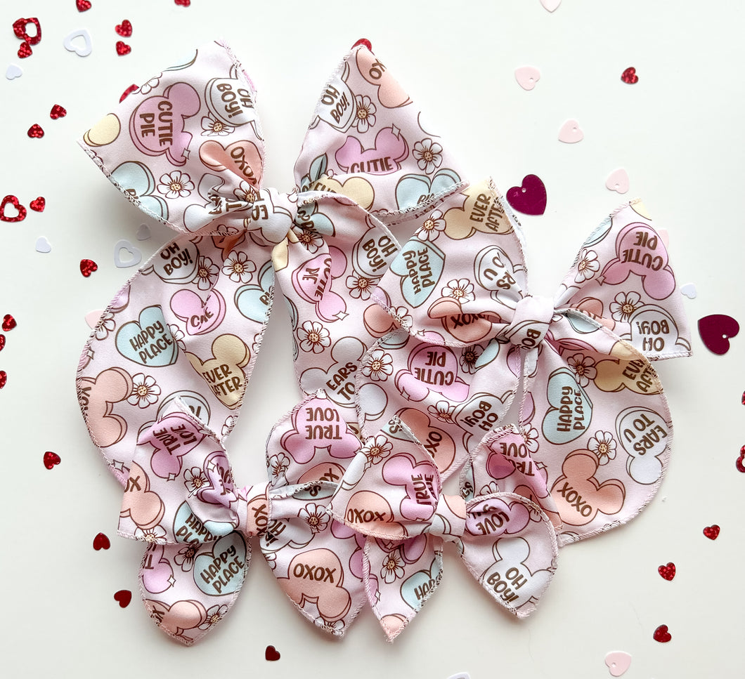 The Mick Conversation Hearts Bow Preorder